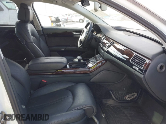 2015 Audi A8 L 4.0T with VIN WAU32AFD4FN002639, listed as a IAAI auction lot 41703951 with 103,722 mi miles. Bid and sale history available at carsss.com. Image 5.