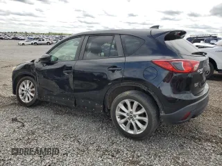 2014 Mazda CX-5 Grand Touring with VIN JM3KE4DY3E0304908, listed as a Copart auction lot 53873655 with 144,382 mi miles and Salvage Title. Bid and sale history available at DreamBid. Image 2.
