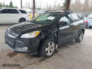 2015 Ford Escape SE with VIN 1FMCU9GX8FUB23311, listed as a IAAI auction lot 41787837 with 101,749 mi miles. Bid and sale history available at carsss.com. Image 2.
