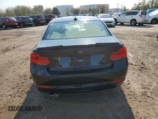 2018 BMW 2 Series 230i xDrive with VIN WBA2J3C57JVA49747, listed as a Copart auction lot 74891334 with Not provided miles and Salvage title. Bid and sale history available at DreamBid. Image 6.