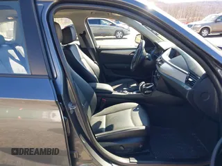 2015 BMW X1 xDrive28i with VIN WBAVL1C59FVY25442, listed as a IAAI auction lot 41854794 with 98,432 mi miles. Bid and sale history available at carsss.com. Image 5.