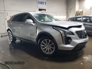 2019 Cadillac XT4 AWD Luxury with VIN 1GYFZBR44KF128401, listed as a Copart auction lot 45926895 with 76,303 mi miles and Salvage Title. Bid and sale history available at carsss.com. Image 4.