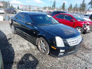 2005 Cadillac STS with VIN 1G6DW677250190268, listed as a IAAI auction lot 41702798 with 142,427 mi miles. Bid and sale history available at carsss.com. Image 1.