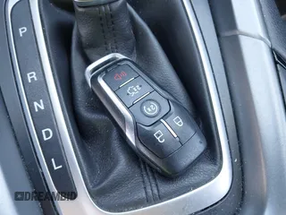 2014 Ford Fusion Titanium Hybrid with VIN 3FA6P0RU9ER147443, listed as a IAAI auction lot 41739540 with 146,359 mi miles. Bid and sale history available at carsss.com. Image 11.