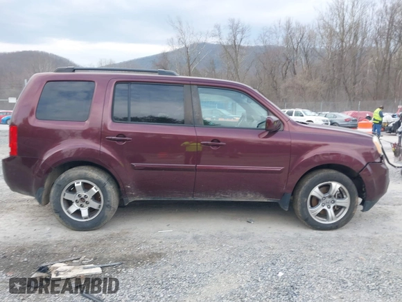 2012 Honda Pilot EX-L with VIN 5FNYF4H51CB045141, listed as a IAAI auction lot 41689396 with 219,792 mi miles and . Bid and sale history available at DreamBid. Image 13.