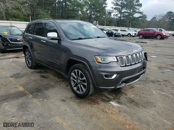 2017 Jeep Grand Cherokee Overland with VIN 1C4RJECG2HC903366, listed as a Copart auction lot 44140155 with 102,459 mi miles and Salvage Title. Bid and sale history available at carsss.com. Image 12.