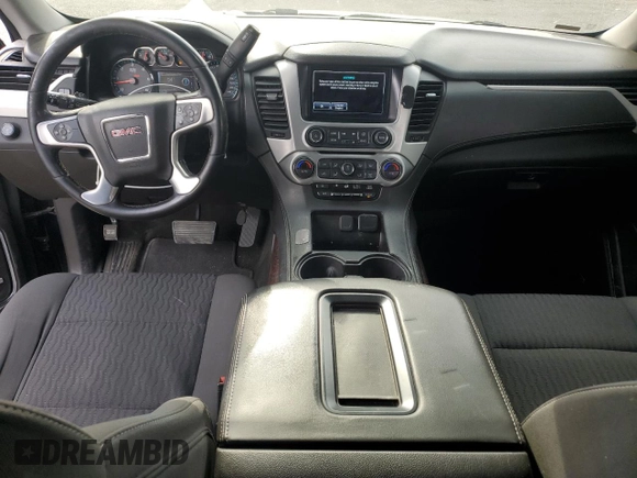 2019 GMC Yukon SLE with VIN 1GKS1AKC2KR101675, listed as a Copart auction lot 87256804 with 144,572 mi miles and Salvage Title. Bid and sale history available at carsss.com. Image 8.
