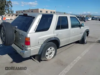 1997 Honda Passport z VIN 4S6CM58V4V4409765, wystawiony jako IAAI lot #41792688 z przebiegiem 124 222 mil mil oraz . Historia ofert i sprzedaży dostępna na DreamBid. Obrazek 4.