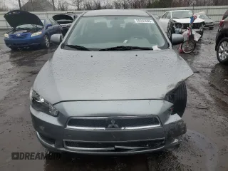 2014 Mitsubishi Lancer SE z VIN JA32V2FW8EU020237, wystawiony jako Copart lot #50333595 z przebiegiem 128 289 mil mil oraz Szkoda całkowita • Salvage title. Historia ofert i sprzedaży dostępna na DreamBid. Obrazek 5.
