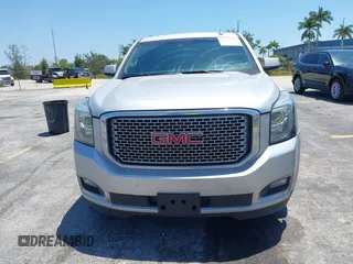 2016 GMC Yukon XL Denali with VIN 1GKS2HKJXGR423556, listed as a IAAI auction lot 42145970 with 118,436 mi miles. Bid and sale history available at carsss.com. Image 12.