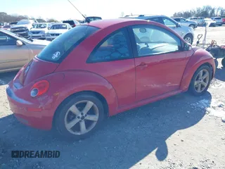 2006 Volkswagen New Beetle Coupe with VIN 3VWSW31C56M403105, listed as a IAAI auction lot 41396362 with 157,213 mi miles. Bid and sale history available at carsss.com. Image 4.