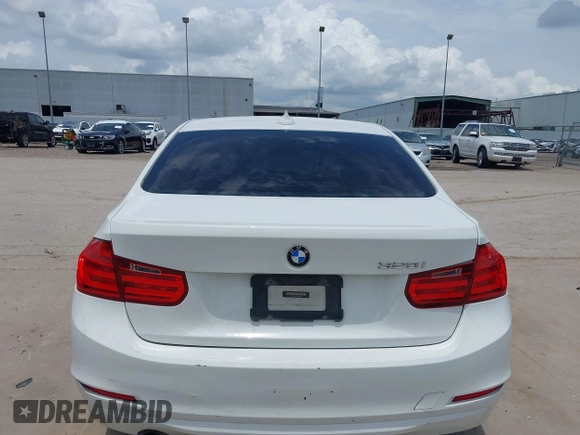 2013 BMW 3 Series 320i with VIN WBA3B1C50DK129576, listed as a IAAI auction lot 42393038 with 160,370 mi miles and . Bid and sale history available at DreamBid. Image 16.