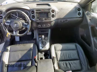 2014 Volkswagen Tiguan SEL z VIN WVGAV3AX6EW030705, wystawiony jako Copart lot #52156805 z przebiegiem 142 377 mil mil oraz Szkoda całkowita • Salvage title. Historia ofert i sprzedaży dostępna na DreamBid. Obrazek 8.