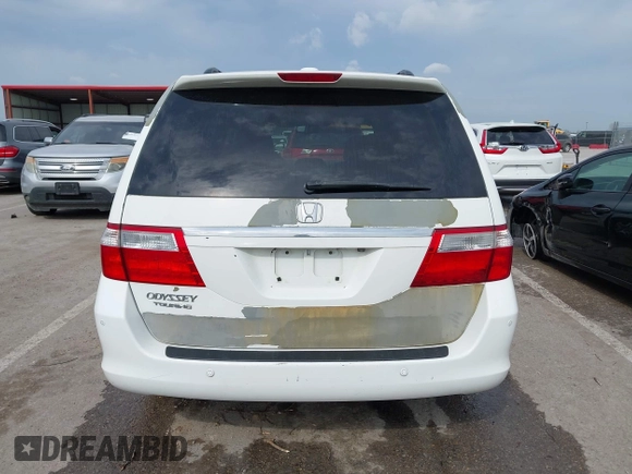 2007 Honda Odyssey Touring with VIN 5FNRL38887B081562, listed as a IAAI auction lot 42000435 with 238,287 mi miles and . Bid and sale history available at DreamBid. Image 17.