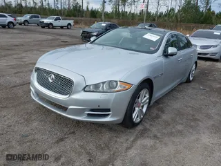 2014 Jaguar XJ with VIN SAJWA2GZ2E8V74309, listed as a IAAI auction lot 40814441 with 1 mi miles. Bid and sale history available at carsss.com. Image 2.