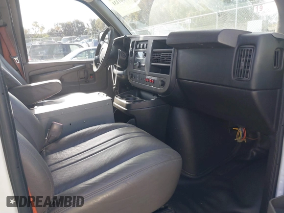 2014 Chevrolet Express Cargo Van with VIN 1GCWGFCB2E1122236, listed as a IAAI auction lot 41381131 with 70,696 mi miles. Bid and sale history available at carsss.com. Image 5.