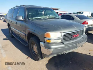 2002 GMC Yukon XL SLT z VIN 1GKFK16Z12J180669, wystawiony jako IAAI lot #42317437 z przebiegiem 168 827 mil mil oraz . Historia ofert i sprzedaży dostępna na DreamBid. Obrazek 1.