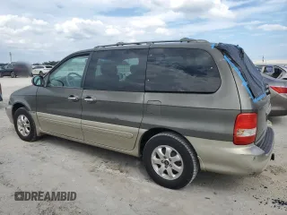 2004 Kia Sedona LX with VIN KNDUP131346575851, listed as a Copart auction lot 73614194 with 153,928 mi miles and Salvage Title. Bid and sale history available at carsss.com. Image 2.