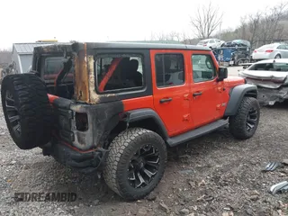 2018 Jeep Wrangler Unlimited Sport z VIN 1C4HJXDN4JW198045, wystawiony jako IAAI lot #41930547 z przebiegiem 62 402 mil mil oraz . Historia ofert i sprzedaży dostępna na DreamBid. Obrazek 4.