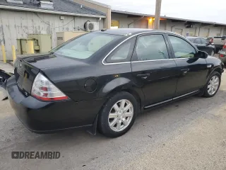 2009 Ford Taurus SE with VIN 1FAHP23W39G121125, listed as a Copart auction lot 80436544 with 122,908 mi miles and Clean Title. Bid and sale history available at carsss.com. Image 3.