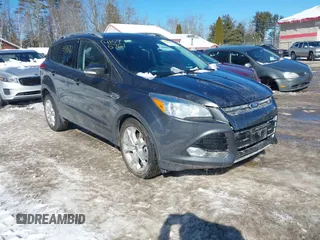 2015 Ford Escape Titanium with VIN 1FMCU9JX6FUB86304, listed as a IAAI auction lot 41595761 with 104,317 mi miles and . Bid and sale history available at DreamBid. Image 1.