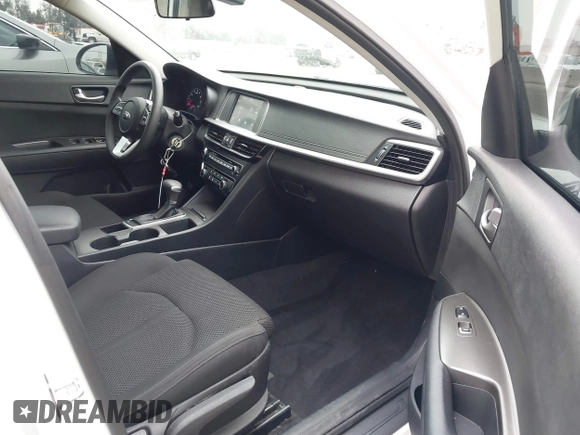 2020 Kia Optima LX z VIN 5XXGT4L3XLG422203, wystawiony jako IAAI lot #42290010 z przebiegiem 38 284 mil mil oraz . Historia ofert i sprzedaży dostępna na DreamBid. Obrazek 5.