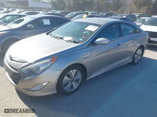 2013 Hyundai Sonata Hybrid Limited with VIN KMHEC4A49DA100762, listed as a IAAI auction lot 41671202 with 209,708 mi miles. Bid and sale history available at carsss.com. Image 2.