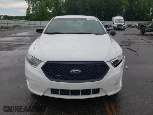 2015 Ford Police Interceptor with VIN 1FAHP2L82FG163718, listed as a Copart auction lot 56392295 with 122,940 mi miles and Salvage title. Bid and sale history available at DreamBid. Image 5.