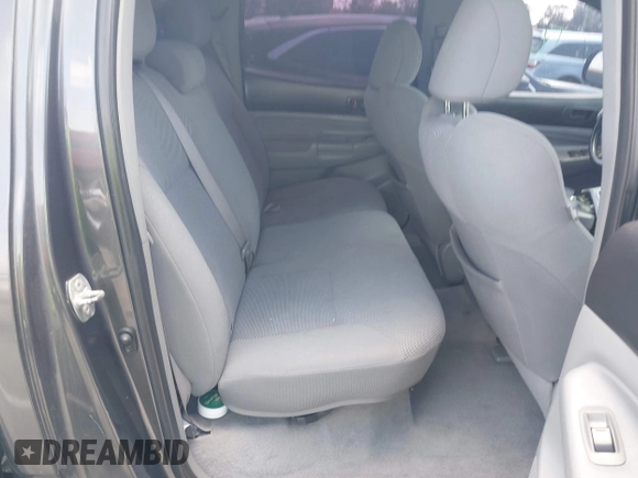 2010 Toyota Tacoma PreRunner with VIN 3TMJU4GN9AM097599, listed as a IAAI auction lot 42153344 with 213,063 mi miles and . Bid and sale history available at DreamBid. Image 8.