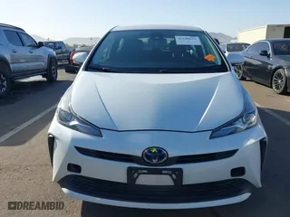 2021 Toyota Prius L Eco with VIN JTDKAMFU7M3133544, listed as a IAAI auction lot 41548653 with 115,214 mi miles. Bid and sale history available at carsss.com. Image 13.