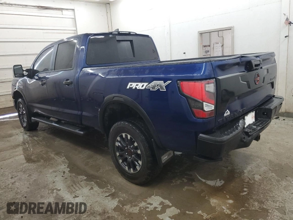 2024 Nissan Titan SV with VIN 1N6AA1FB2RN104714, listed as a Copart auction lot 56576955 with 25,800 mi miles and Salvage title. Bid and sale history available at DreamBid. Image 2.