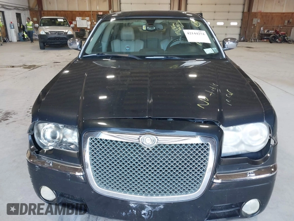 2006 Chrysler 300 C with VIN 2C3KA63H06H421414, listed as a IAAI auction lot 42144274 with 118,692 mi miles. Bid and sale history available at carsss.com. Image 6.