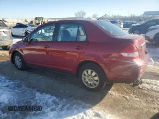 2009 Nissan Versa 1.8 S with VIN 3N1BC11E39L400203, listed as a Copart auction lot 88673145 with 105,578 mi miles and Salvage Title. Bid and sale history available at carsss.com. Image 2.