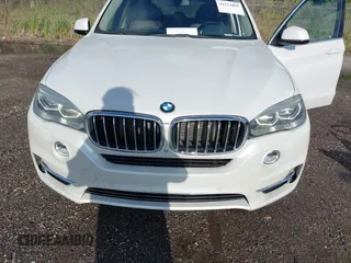 2015 BMW X5 xDrive35i z VIN 5UXKR0C53F0K58025, wystawiony jako IAAI lot #42222805 z przebiegiem 95 979 mil mil oraz . Historia ofert i sprzedaży dostępna na DreamBid. Obrazek 6.