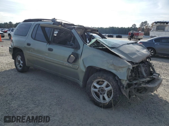 2004 GMC Envoy XL SLE with VIN 1GKET16S346115131, listed as a Copart auction lot 82677024 with 290,656 mi miles and Salvage Title. Bid and sale history available at carsss.com. Image 4.