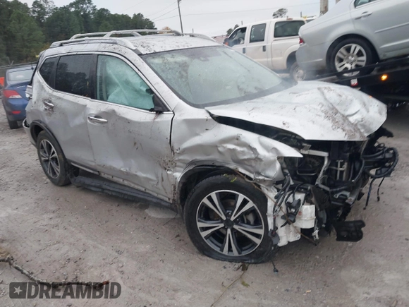 2017 Nissan Rogue SV with VIN JN8AT2MT7HW143178, listed as a IAAI auction lot 41015343 with 139,828 mi miles and . Bid and sale history available at DreamBid. Image 1.