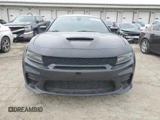 2021 Dodge Charger Scat Pack with VIN 2C3CDXGJ7MH584590, listed as a Copart auction lot 46396325 with 51,257 mi miles and Salvage Title. Bid and sale history available at DreamBid. Image 5.