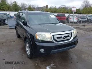 2011 Honda Pilot EX-L with VIN 5FNYF4H51BB080874, listed as a IAAI auction lot 42034400 with 194,080 mi miles and . Bid and sale history available at carsss.com. Image 1.