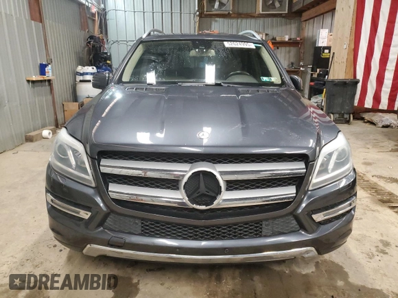 2014 Mercedes-Benz GL 450 z VIN 4JGDF7CE1EA311613, wystawiony jako Copart lot #52624995 z przebiegiem 134 404 mil mil oraz Tytuł czysty. Historia ofert i sprzedaży dostępna na DreamBid. Obrazek 5.