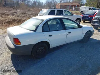 1999 Saturn SL with VIN 1G8ZH5282XZ178928, listed as a IAAI auction lot 41758412 with 249,418 mi miles. Bid and sale history available at carsss.com. Image 4.