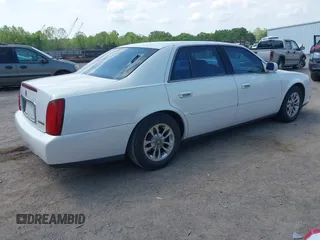 2004 Cadillac DeVille z VIN 1G6KD54Y04U156194, wystawiony jako IAAI lot #42143148 z przebiegiem 141 938 mil mil oraz . Historia ofert i sprzedaży dostępna na DreamBid. Obrazek 4.