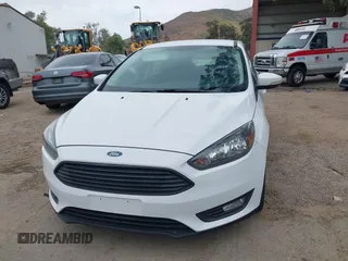 2016 Ford Focus SE with VIN 1FADP3KE8GL331379, listed as a IAAI auction lot 42111348 with 66,130 mi miles and . Bid and sale history available at carsss.com. Image 6.