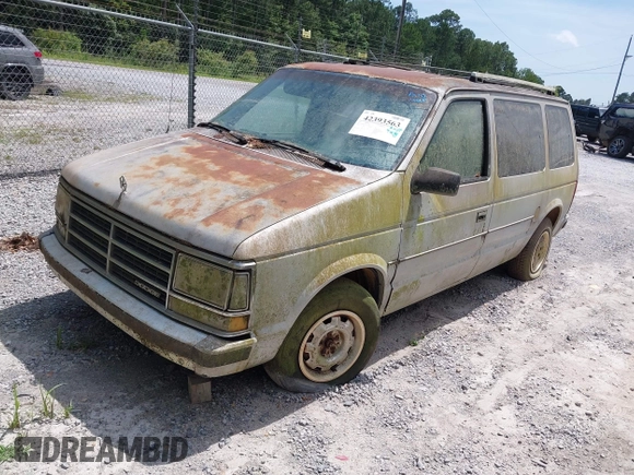 1987 Dodge Caravan z VIN 2B4FK41G3HR127301, wystawiony jako IAAI lot #42393563 z przebiegiem Nie podano mil oraz . Historia ofert i sprzedaży dostępna na DreamBid. Obrazek 2.