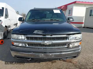 2004 Chevrolet Suburban LT z VIN 3GNFK16T44G206586, wystawiony jako IAAI lot #41480840 z przebiegiem Nie podano mil oraz . Historia ofert i sprzedaży dostępna na DreamBid. Obrazek 11.
