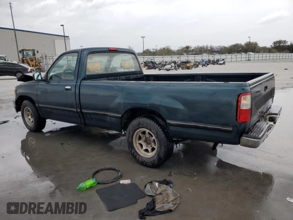 1994 Toyota T100 DX with VIN JT4VD10A6R0017701, listed as a Copart auction lot 46034975 with 219,651 mi miles and Salvage Title. Bid and sale history available at DreamBid. Image 2.