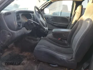 2000 Dodge Dakota z VIN 1B7FL26X5YS793314, wystawiony jako Copart lot #79477744 z przebiegiem 358 319 mil mil oraz Szkoda całkowita • Salvage title. Historia ofert i sprzedaży dostępna na DreamBid. Obrazek 7.