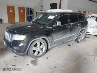 2011 Jeep Grand Cherokee Overland with VIN 1J4RR6GTXBC701186, listed as a IAAI auction lot 41553697 with 172,317 mi miles. Bid and sale history available at carsss.com. Image 2.