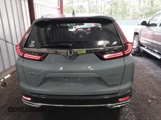 2020 Honda CR-V Touring z VIN 2HKRW2H90LH608435, wystawiony jako IAAI lot #42318256 z przebiegiem 32 602 mil mil oraz . Historia ofert i sprzedaży dostępna na DreamBid. Obrazek 16.