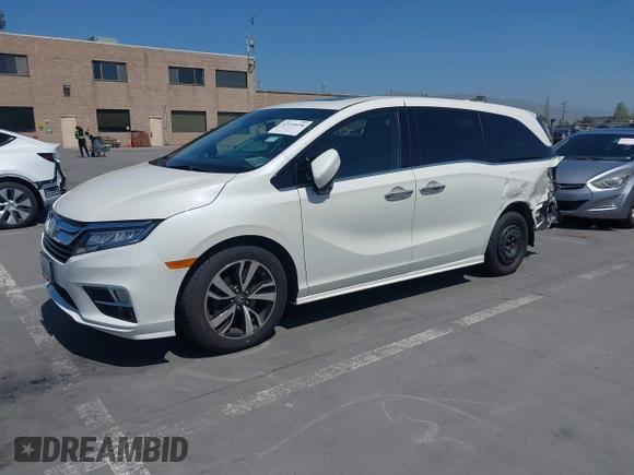 2018 Honda Odyssey Elite with VIN 5FNRL6H92JB005420, listed as a IAAI auction lot 42193696 with 78,623 mi miles and . Bid and sale history available at DreamBid. Image 2.