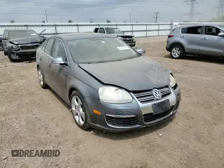 2008 Volkswagen Jetta SE z VIN 3VWRM71K08M099347, wystawiony jako Copart lot #57061795 z przebiegiem 129 225 mil mil oraz Szkoda całkowita • Salvage title. Historia ofert i sprzedaży dostępna na DreamBid. Obrazek 13.
